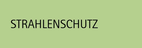Grüne Kachel mit der Aufschrift "Strahlenschutz"